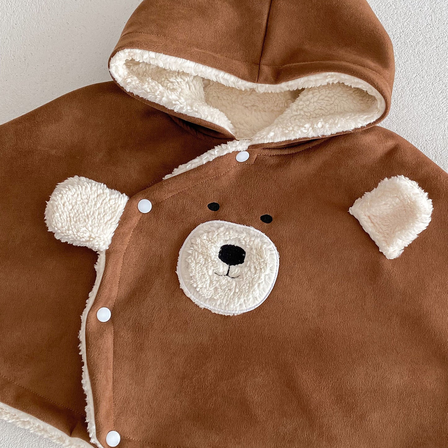 “Little bear hug” poncho