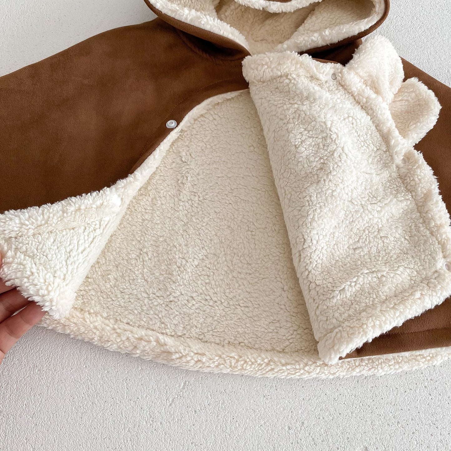 “Little bear hug” poncho